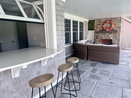 New Seabury Cape Cod vacation rental - 2nd kitchen opens to bar and outdoor living room at pool level