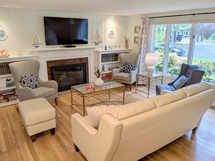 Centerville Cape Cod vacation rental - Living room with the fireplace, smart TV, DVD player, board games