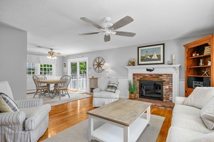 West Harwich Cape Cod vacation rental - Living room opens to dining area