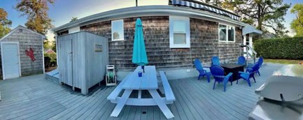 Dennisport Cape Cod vacation rental - Backyard- with outdoor shower, gas grill and gas firepit