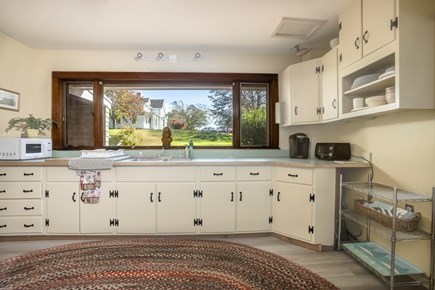 Woods Hole Cape Cod vacation rental - full kitchen overlooking open space.
