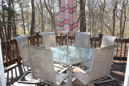 Brewster Cape Cod vacation rental - Deck with outdoor table, chairs & Umbrella