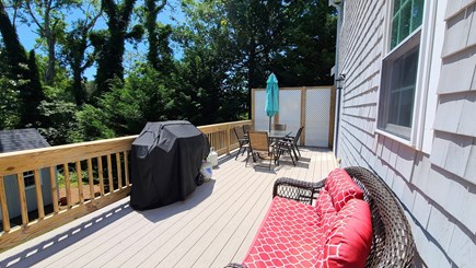 Wellfleet Cape Cod vacation rental - Deck with dining table and gas grill