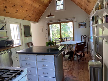 North Truro Cape Cod vacation rental - Kitchen looking out toward deck.