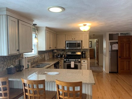 Harwich Cape Cod vacation rental - Updated kitchen with breakfast bar