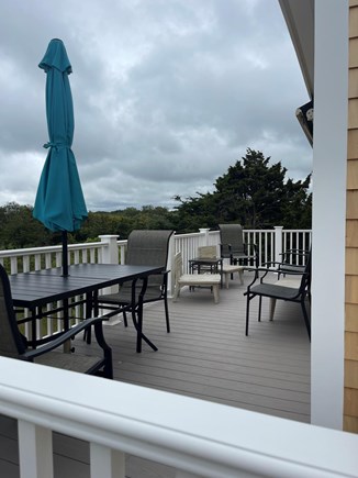Sandwich, Sagamore Beach Cape Cod vacation rental - Deck with lovely view of the side and backyard
