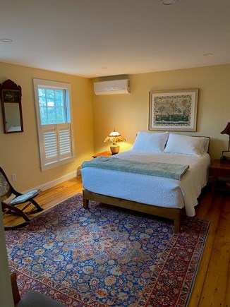 Wellfleet Center Cape Cod vacation rental - Second Floor bedroom has a Queen bed and closet w. rod & shelves