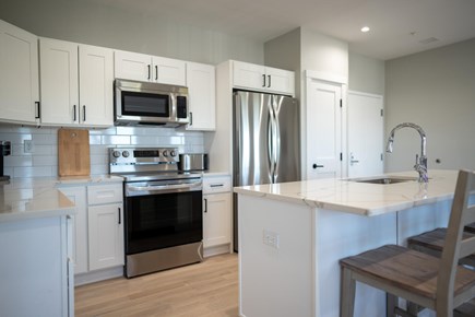 West Dennis Cape Cod vacation rental - Fully equipped kitchen with breakfast bar