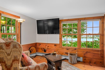 Bourne, Buzzards Bay Cape Cod vacation rental - 1st flr bedroom sitting area. Watch the TV or just enjoy the view