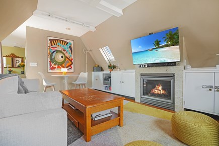 Provincetown Cape Cod vacation rental - Living room facing the fireplace and TV Audio