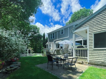 Centerville Cape Cod vacation rental - Fenced Yard-outdoor seating area, weber gas grill, outdoor shower