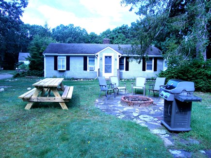 East Sandwich Cape Cod vacation rental - Front Yard wth fire pit, Weber Grill and picnic table