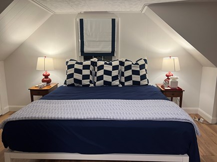 Falmouth Cape Cod vacation rental - 2nd floor, king bedroom, dresser, vanity, mirror, ceiling fan, TV