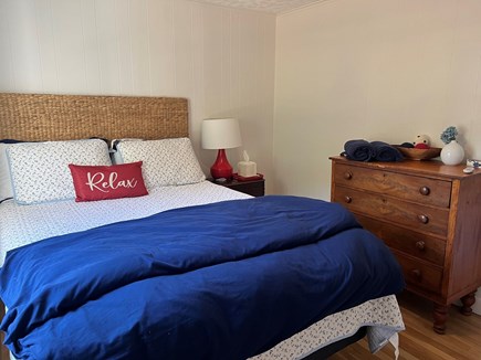 Falmouth Cape Cod vacation rental - 1st floor - queen bed, dresser, ceiling fan, hamper, mirror