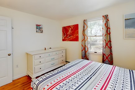 Truro Cape Cod vacation rental - Second bedroom again; I made that big red painting myself!