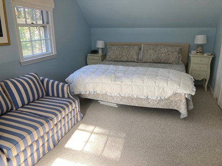 New Seabury Cape Cod vacation rental - Master bedroom with king bed, sofa, and portable crib.