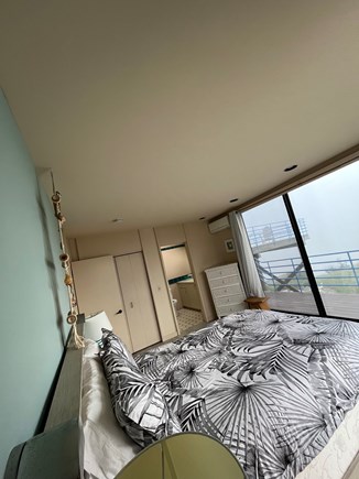South Wellfleet on the Ocean Cape Cod vacation rental - Guest Bedroom 1: Queen bed with sliders onto deck & en suite bath