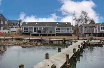 Dennis, Serene Riverside Haven Cape Cod vacation rental - Shared backyard dock with access to Swan River