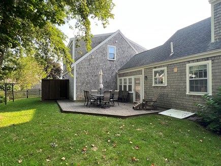 Barnstable Cape Cod vacation rental - Large fenced yard with patio