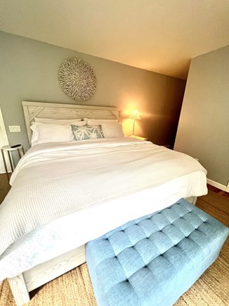 Chatham Cape Cod vacation rental - 1st flr coastal primary ensuite bedroom with king bed & smart TV.