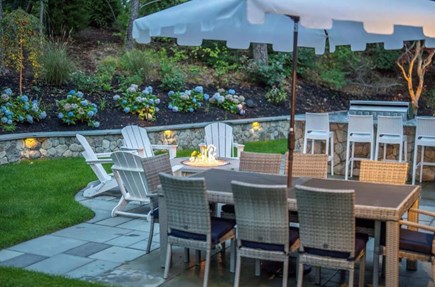 Chatham Cape Cod vacation rental - Ultimate backyard oasis. Outdoor kitchen, fire pit  and dinning.
