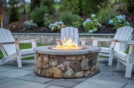 Chatham Cape Cod vacation rental - New gas fire pit and Adirondack chairs.