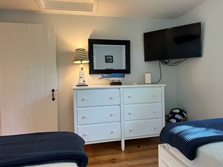 Brewster Cape Cod vacation rental - Bedroom 3 - tv & dresser, kids games, toys, and books. Comfy beds