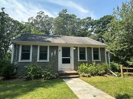 Brewster Cape Cod vacation rental - Large wooded lot & circle driveway with plenty of parking.