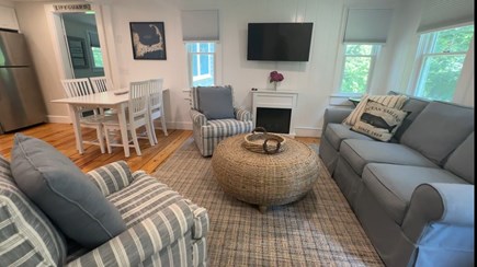 Brewster Cape Cod vacation rental - Comfortable Living room with smart Tv and electric fireplace.