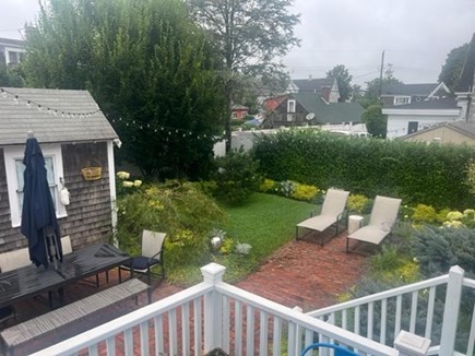 Provincetown, West End Cape Cod vacation rental - Backyard table for entertaining, porch for morning coffee.