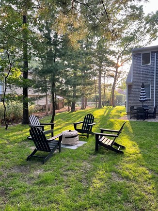 East Falmouth Cape Cod vacation rental - Enjoy the backyard fire pit on chilly summer evenings.