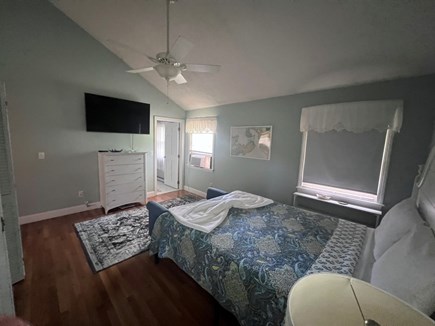 East Falmouth Cape Cod vacation rental - Master bedroom w/ 2 large closets, large TV and master bath