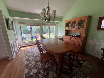 East Falmouth Cape Cod vacation rental - Dining room opens to kitchen and looks out to lovely backyard.