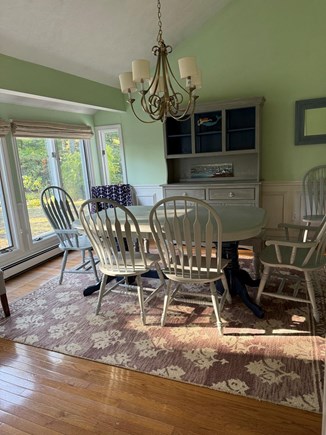 East Falmouth Cape Cod vacation rental - The dining room looks out to an expansive backyard