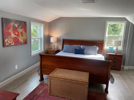 Orleans Cape Cod vacation rental - upstairs bedroom with king bed and pool views, ample closet space