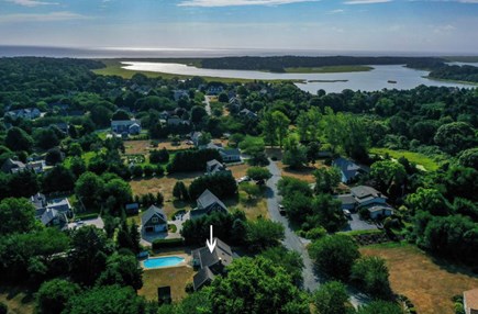 Orleans Cape Cod vacation rental - Picturesque aerial view of the property with large o ground pool