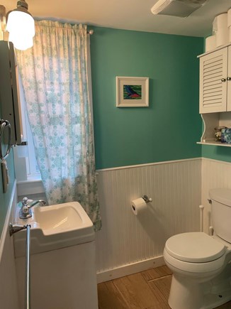 Truro Cape Cod vacation rental - Bathroom with corner shower to right of this view.