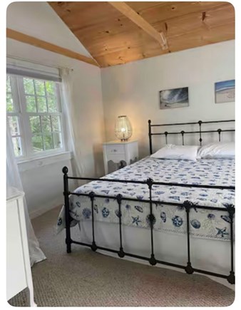 Truro Cape Cod vacation rental - Alt view of primary bedroom. Dresser and closet rod for storage