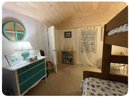 Truro Cape Cod vacation rental - 2nd bedroom features twin over full bunk, portable crib option.