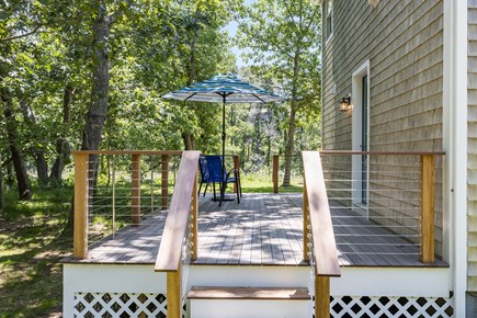 Wellfleet Cape Cod vacation rental - Deck with table, sun umbrella and grill