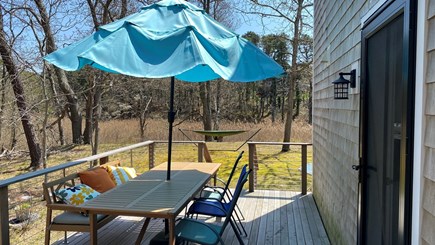 Wellfleet Cape Cod vacation rental - Deck w/grill and dining table for 8 people. Hammock in background