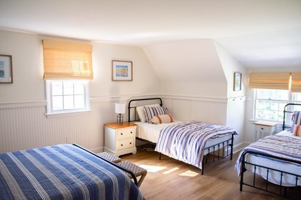 Falmouth Cape Cod vacation rental - Large upstairs bedroom with 1 queen & 2 twin beds