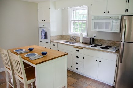 Falmouth Cape Cod vacation rental - Open kitchen with island seating for two