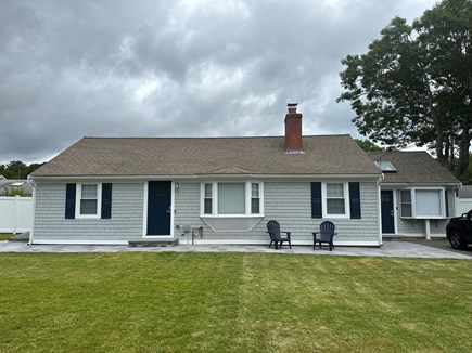 South Yarmouth Cape Cod vacation rental - Front view.  Nantucket pavers and 2 Adirondack chairs