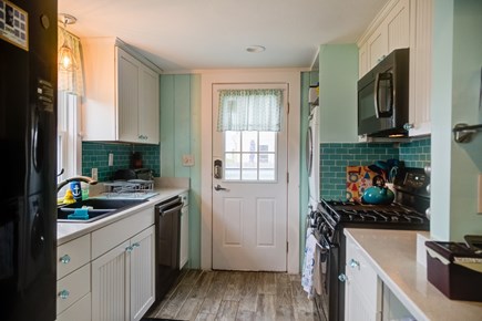 Centerville Cape Cod vacation rental - Kitchen with washer/dryer and side door
