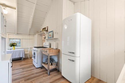 Harwich Port Cape Cod vacation rental - Kitchen with Smeg Fridge and Breakfast Nook