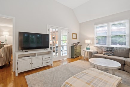 Brewster Cape Cod vacation rental - French doors take you from the dining space to the TV room
