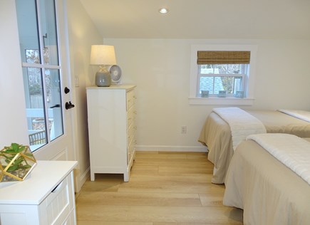 Dennisport Cape Cod vacation rental - Twin bedroom with door to back porch