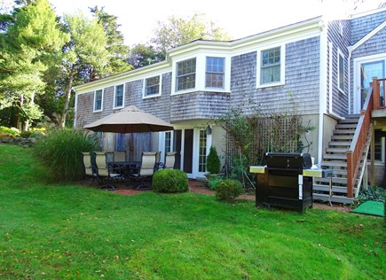 East Orleans Cape Cod vacation rental - Large and private backyard with seating area, grill, shower