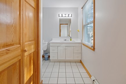 Wellfleet Cape Cod vacation rental - Half bathroom in laundry room on the first floor